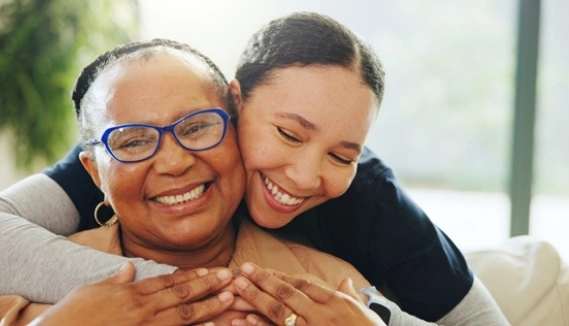 Mother and child hugging